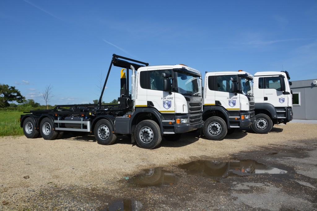 The vehicles are equipped with sliding Hyva hookloaders